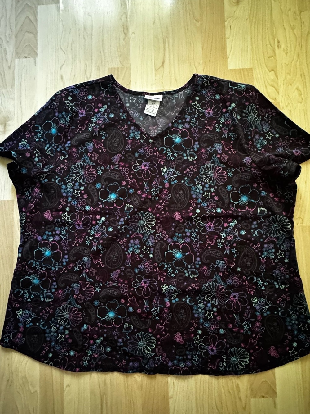 Women's Floral Paisley V-Neck Scrub Top. Black with Purple & Teal Flower Accents